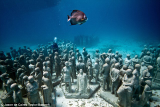 Illustration for article titled This Haunting Reef Is Made Out of (Fake) People